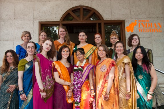 indian wedding guests wearing saris